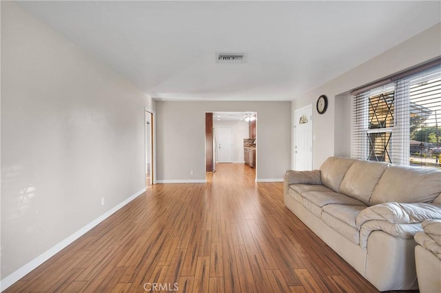 11777 Preston Ln, Yucaipa, CA 92399 - living area with wood finished floors and baseboards