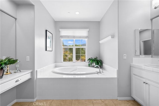 46239 Lone Pine Dr, Temecula, CA 92592 - bathroom with vanity, a garden tub, tile patterned floors, and baseboards