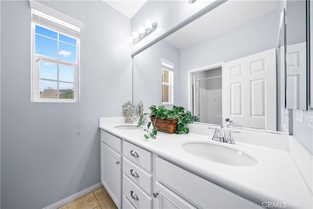 46239 Lone Pine Dr, Temecula, CA 92592 - full bath with double vanity, baseboards, a shower, and tile patterned flooring