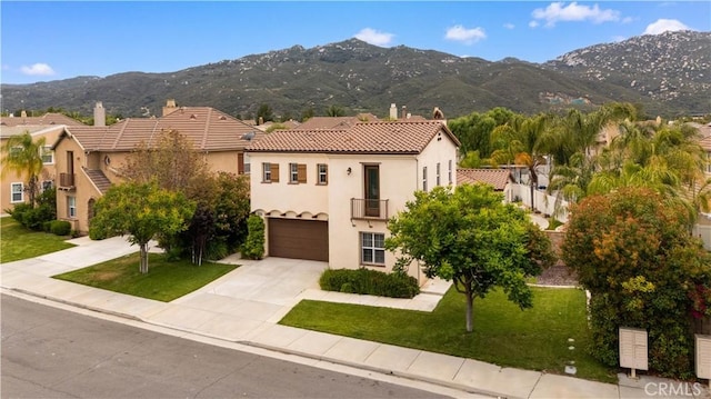 46239 Lone Pine Dr, Temecula, CA 92592 - mediterranean / spanish house featuring stucco siding, a mountain view, driveway, and a chimney