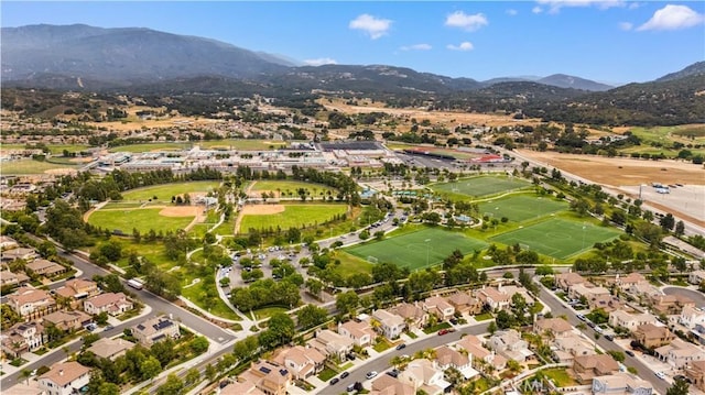 46239 Lone Pine Dr, Temecula, CA 92592 - aerial view of property and surrounding area featuring a mountainous background and nearby suburban area