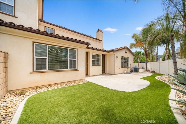 46239 Lone Pine Dr, Temecula, CA 92592 - rear view of property with a patio area, a chimney, stucco siding, a tiled roof, and central AC unit