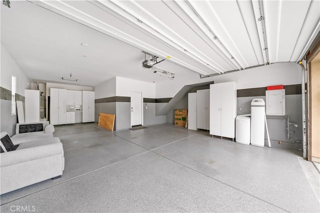 46239 Lone Pine Dr, Temecula, CA 92592 - garage featuring a garage door opener
