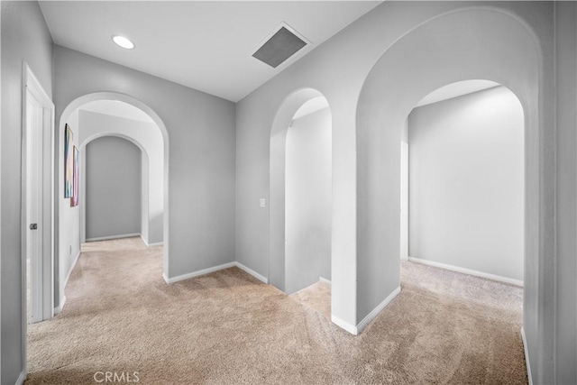 46239 Lone Pine Dr, Temecula, CA 92592 - corridor featuring carpet flooring, arched walkways, baseboards, and recessed lighting