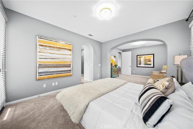 46239 Lone Pine Dr, Temecula, CA 92592 - bedroom featuring arched walkways, carpet flooring, and baseboards