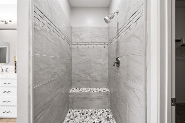 46239 Lone Pine Dr, Temecula, CA 92592 - bathroom featuring tiled shower and vanity