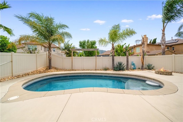 46239 Lone Pine Dr, Temecula, CA 92592 - view of pool with a fire pit, a fenced backyard, and a patio
