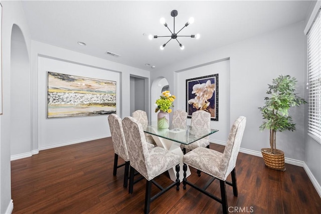 46239 Lone Pine Dr, Temecula, CA 92592 - dining room with arched walkways, a chandelier, wood finished floors, and baseboards