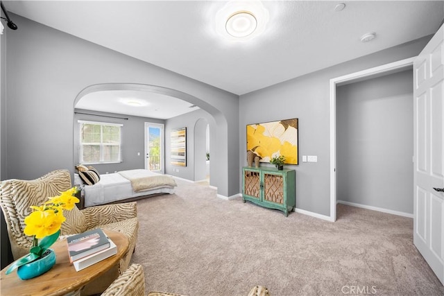 46239 Lone Pine Dr, Temecula, CA 92592 - bedroom featuring arched walkways, carpet, and baseboards