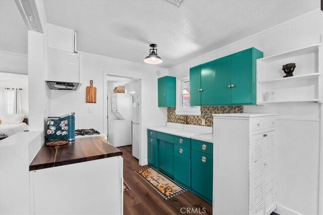 1698 Thrush Rd, Wrightwood, CA 92397 - kitchen with dark wood finished floors, open shelves, backsplash, extractor fan, and butcher block countertops
