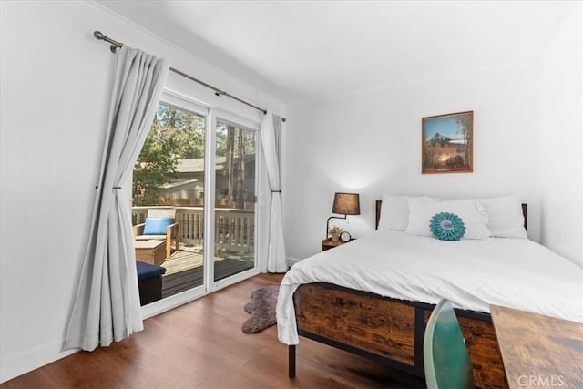 1698 Thrush Rd, Wrightwood, CA 92397 - bedroom featuring access to exterior and wood finished floors