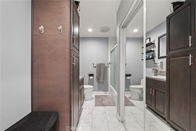 15326 Leffingwell Rd, Whittier, CA 90604 - bathroom with vanity, marble look tile flooring, bath / shower combo with glass door, and recessed lighting