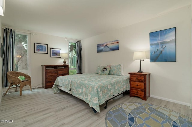 3700 Dean Dr Unit 1805, Ventura, CA 93003 - bedroom featuring light wood finished floors and baseboards