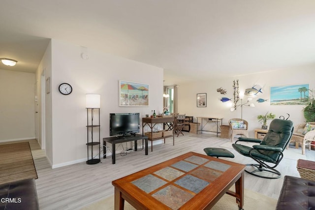 3700 Dean Dr Unit 1805, Ventura, CA 93003 - living area with wood finished floors and baseboards