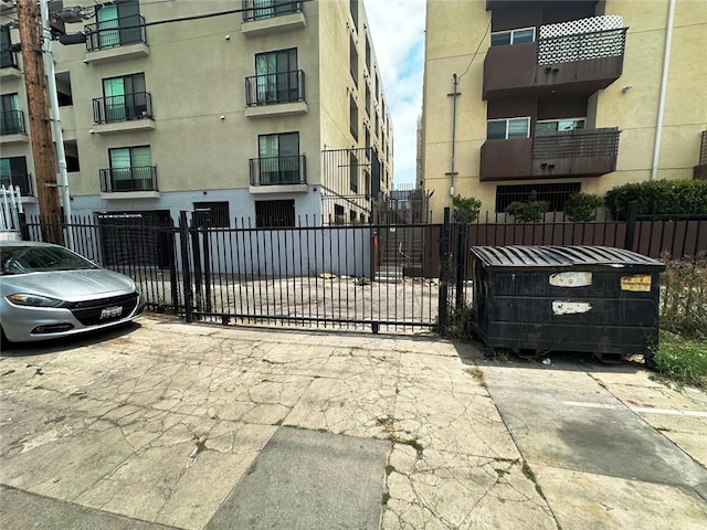 1136 Arapahoe St, Los Angeles, CA 90006 - view of apartment building / complex featuring uncovered parking