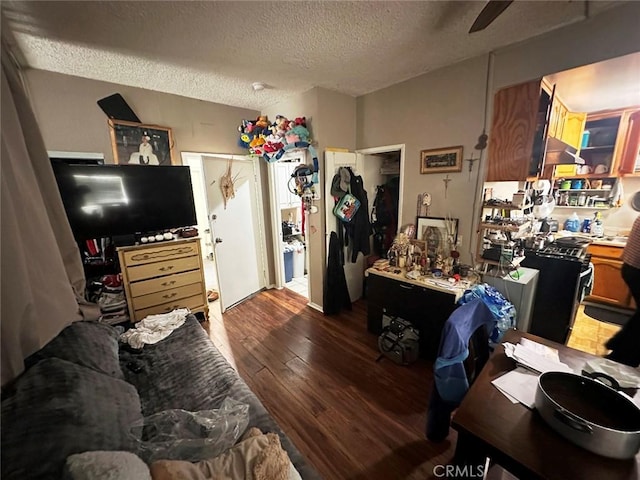 1136 Arapahoe St, Los Angeles, CA 90006 - living room featuring hardwood / wood-style flooring, a textured ceiling, and a ceiling fan