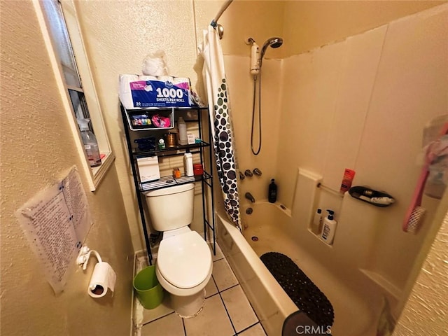 1136 Arapahoe St, Los Angeles, CA 90006 - bathroom featuring a textured wall, toilet, tile patterned floors, and shower / bath combo with shower curtain