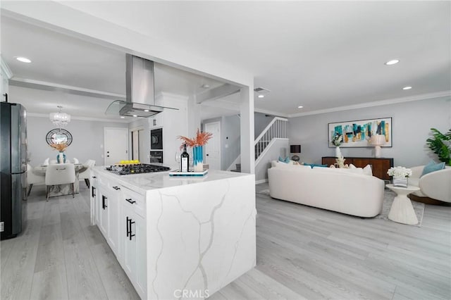 23064 Paseo De Terrado Unit 2, Diamond Bar, CA 91765 - kitchen with ventilation hood, stainless steel appliances, white cabinetry, open floor plan, and light wood-style flooring