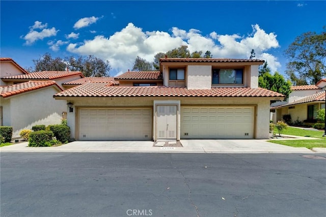 23064 Paseo De Terrado Unit 2, Diamond Bar, CA 91765 - mediterranean / spanish house featuring stucco siding and driveway
