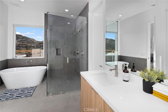 5890 Olema Rd, Yucca Valley, CA 92284 - bathroom with a shower stall, vanity, a soaking tub, and recessed lighting