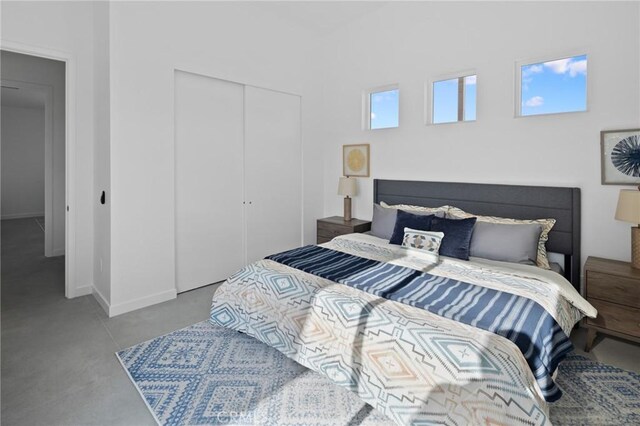 5890 Olema Rd, Yucca Valley, CA 92284 - bedroom featuring a closet and baseboards