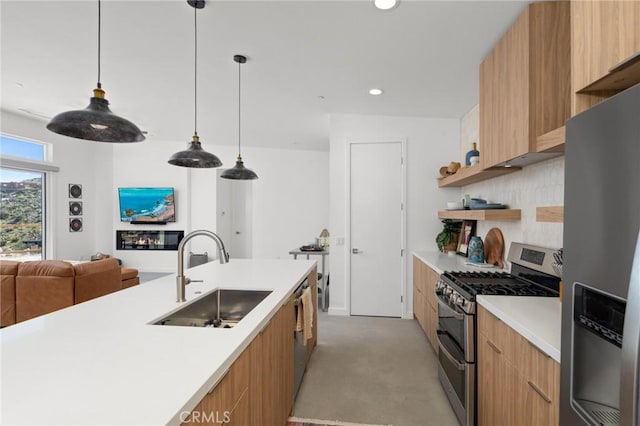 5890 Olema Rd, Yucca Valley, CA 92284 - kitchen featuring stainless steel appliances, a sink, modern cabinets, light carpet, and light countertops