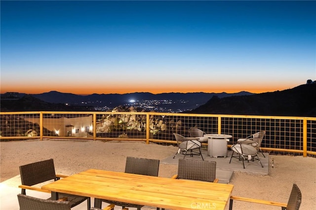 5890 Olema Rd, Yucca Valley, CA 92284 - view of patio featuring outdoor dining area and a mountain view