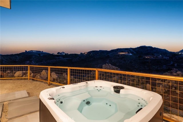 5890 Olema Rd, Yucca Valley, CA 92284 - view of patio featuring a mountain view and a hot tub