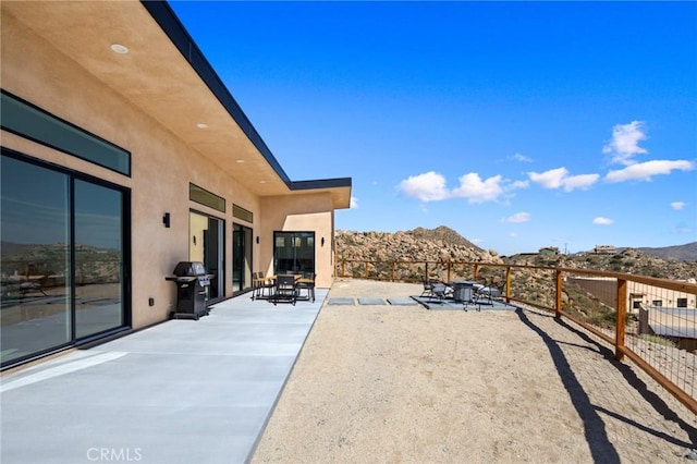 5890 Olema Rd, Yucca Valley, CA 92284 - view of yard featuring a mountain view and a patio area