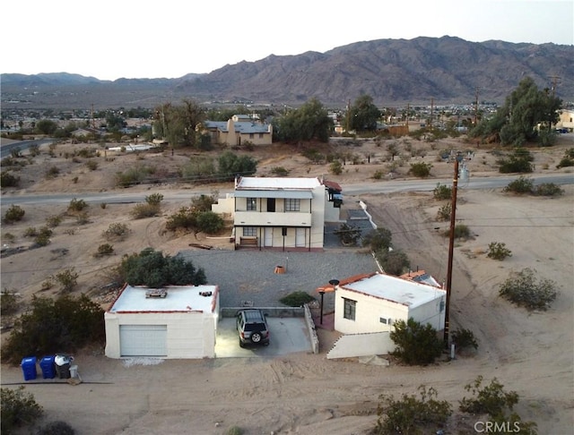 73752 Crestview Dr Unit 29, Palms, CA 92277 - aerial view of property and surrounding area with a mountainous background and a desert landscape