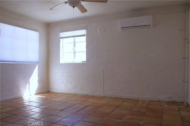 73752 Crestview Dr Unit 29, Palms, CA 92277 - unfurnished room featuring a wall unit AC, plenty of natural light, ceiling fan, and light tile patterned flooring