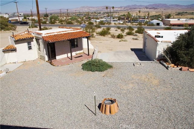 73752 Crestview Dr Unit 29, Palms, CA 92277 - aerial view of property and surrounding area featuring a mountainous background