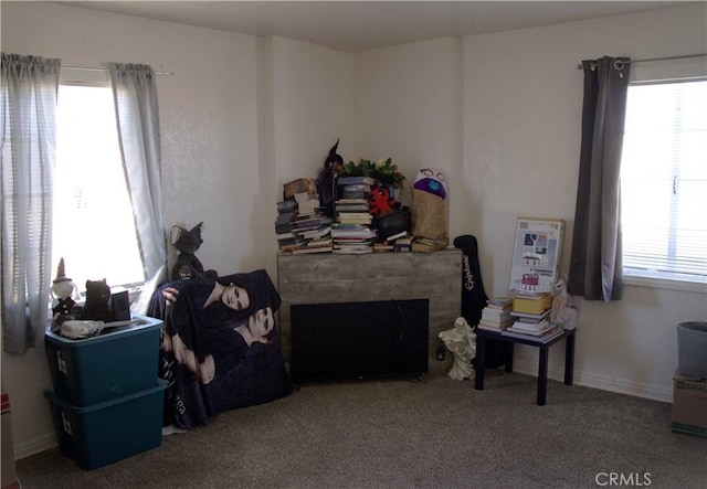 73752 Crestview Dr Unit 29, Palms, CA 92277 - bedroom featuring multiple windows, carpet flooring, and a high end fireplace