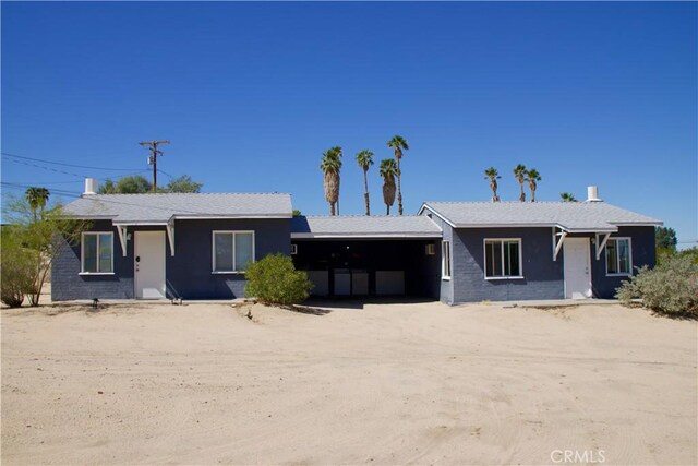 73514 Desert Trail Dr Unit 29, Palms, CA 92277 - ranch-style home with driveway