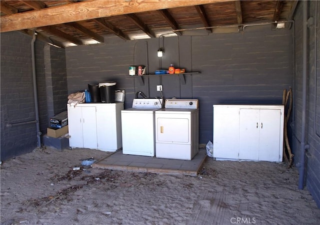 73514 Desert Trail Dr Unit 29, Palms, CA 92277 - garage featuring washing machine and dryer