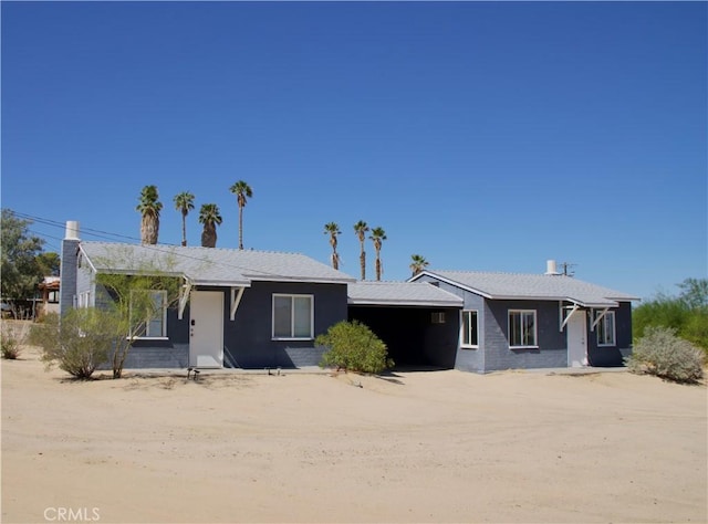 73514 Desert Trail Dr Unit 29, Palms, CA 92277 - view of single story home