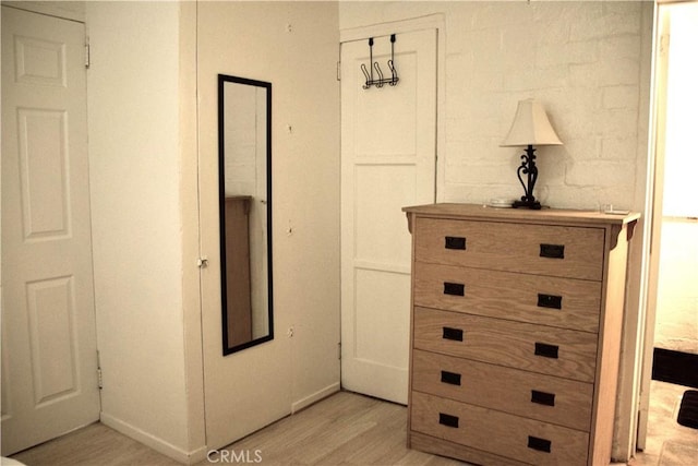 73514 Desert Trail Dr Unit 29, Palms, CA 92277 - bedroom with baseboards and light wood-style floors