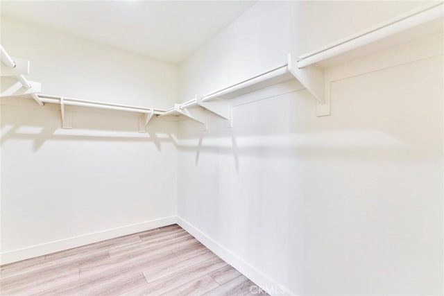 2563 Pepperdale Dr, Rowland Heights, CA 91748 - walk in closet with light wood-style flooring
