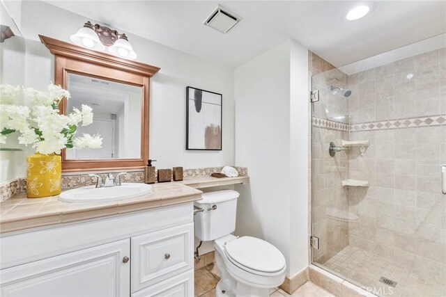 2563 Pepperdale Dr, Rowland Heights, CA 91748 - bathroom featuring toilet, vanity, a shower stall, and tile patterned flooring