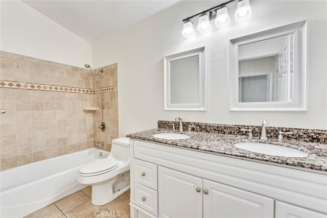 2563 Pepperdale Dr, Rowland Heights, CA 91748 - full bath with toilet, double vanity, bathtub / shower combination, and tile patterned floors