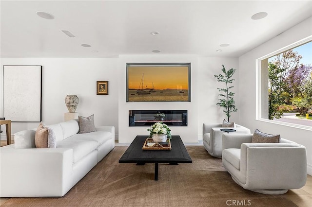 5 Modesto, Irvine, CA 92602 - living area featuring a glass covered fireplace
