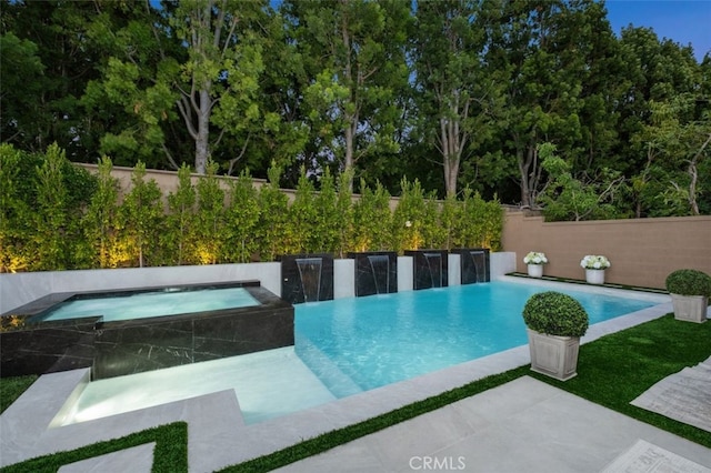 5 Modesto, Irvine, CA 92602 - view of pool featuring an in-ground hot tub, a fenced backyard, and view of wooded area