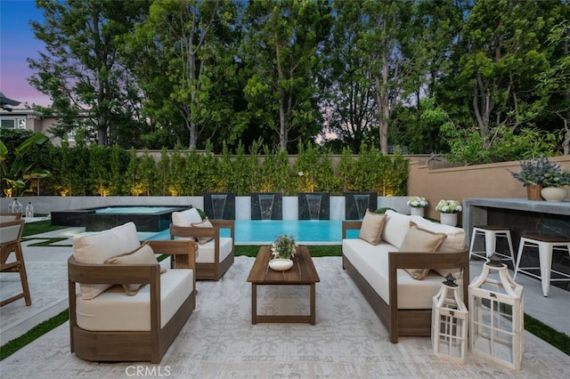 5 Modesto, Irvine, CA 92602 - view of patio / terrace with a hot tub and an outdoor hangout area