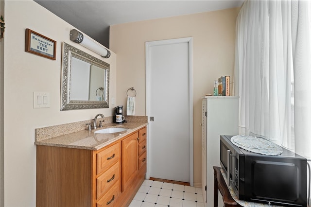 16762 Madrone Cir, Fountain Valley, CA 92708 - bathroom with vanity and tile patterned floors