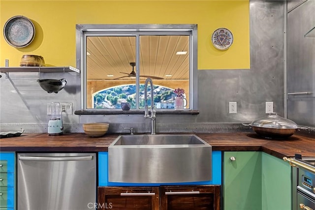 801 Box Canyon Rd, Canoga Park, CA 91304 - kitchen with butcher block countertops, stainless steel dishwasher, and a sink