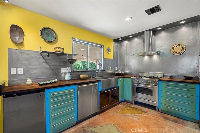 801 Box Canyon Rd, Canoga Park, CA 91304 - kitchen with appliances with stainless steel finishes, butcher block countertops, a sink, island exhaust hood, and tasteful backsplash