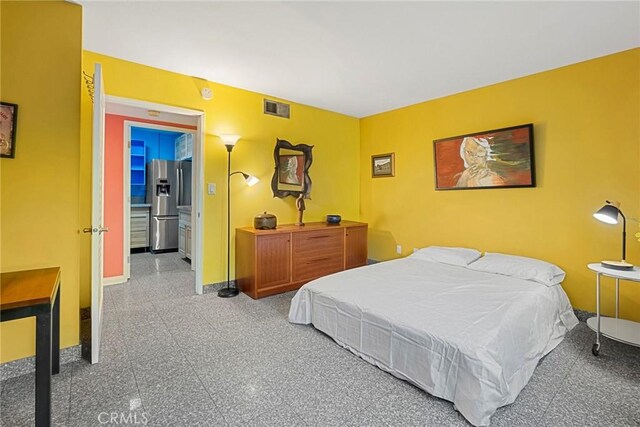 801 Box Canyon Rd, Canoga Park, CA 91304 - bedroom with stainless steel refrigerator with ice dispenser, granite tiled floors, and baseboards