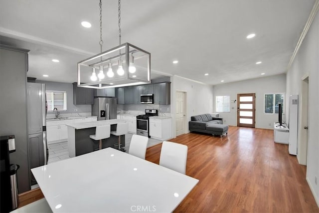 15510 Midcrest Dr, Whittier, CA 90604 - dining room with recessed lighting and light wood finished floors