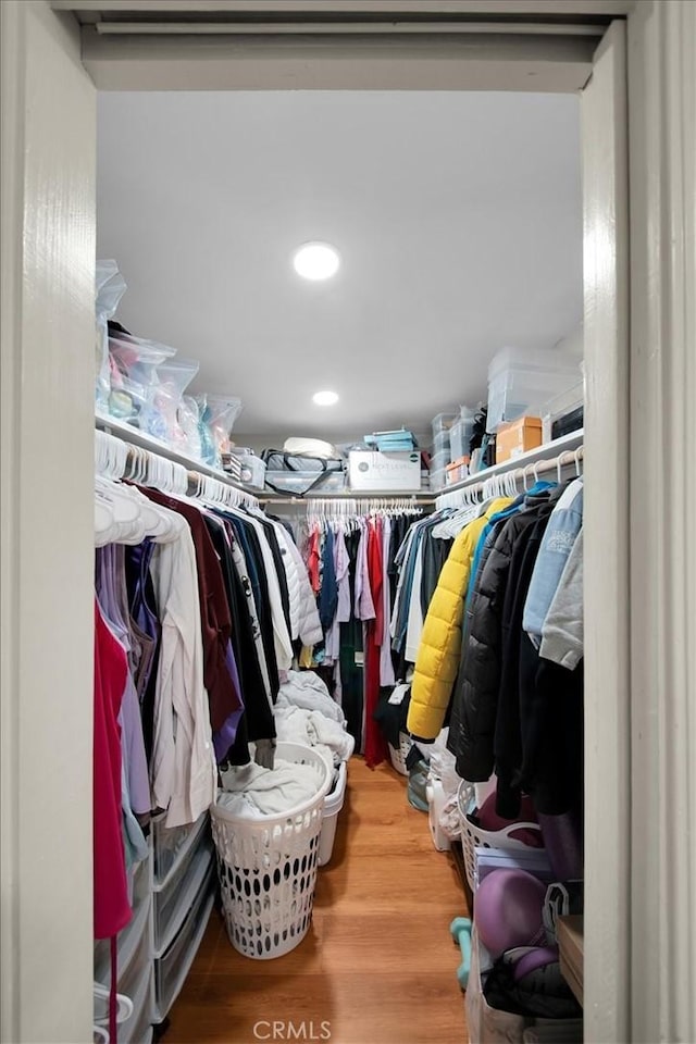 15510 Midcrest Dr, Whittier, CA 90604 - walk in closet featuring wood finished floors