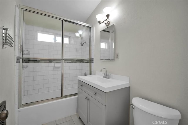 15510 Midcrest Dr, Whittier, CA 90604 - bathroom featuring vanity, toilet, bath / shower combo with glass door, and tile patterned floors